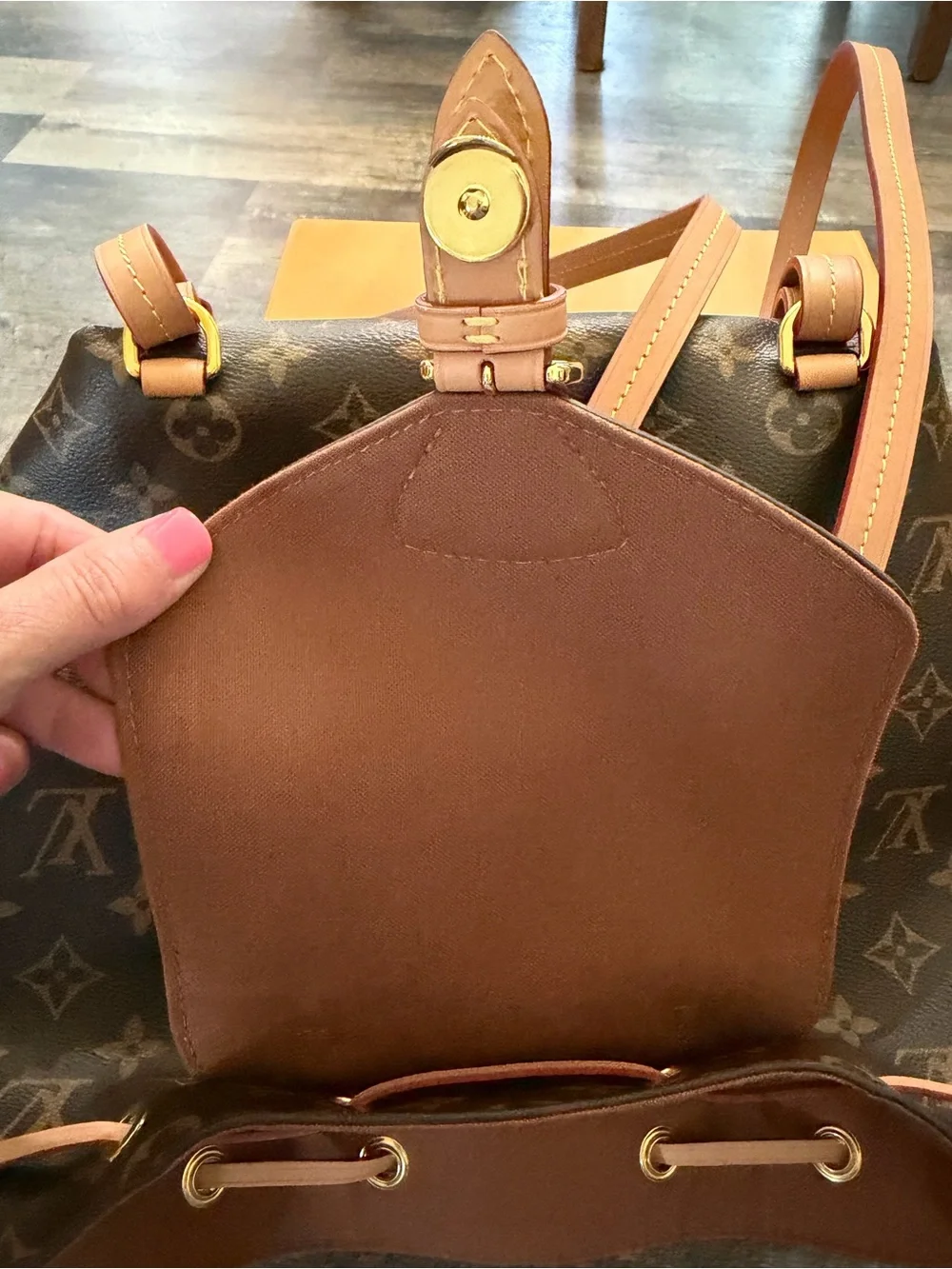 Louis Vuitton Monogram Canvas Backpack with Tan Leather Trim and Pink Charm